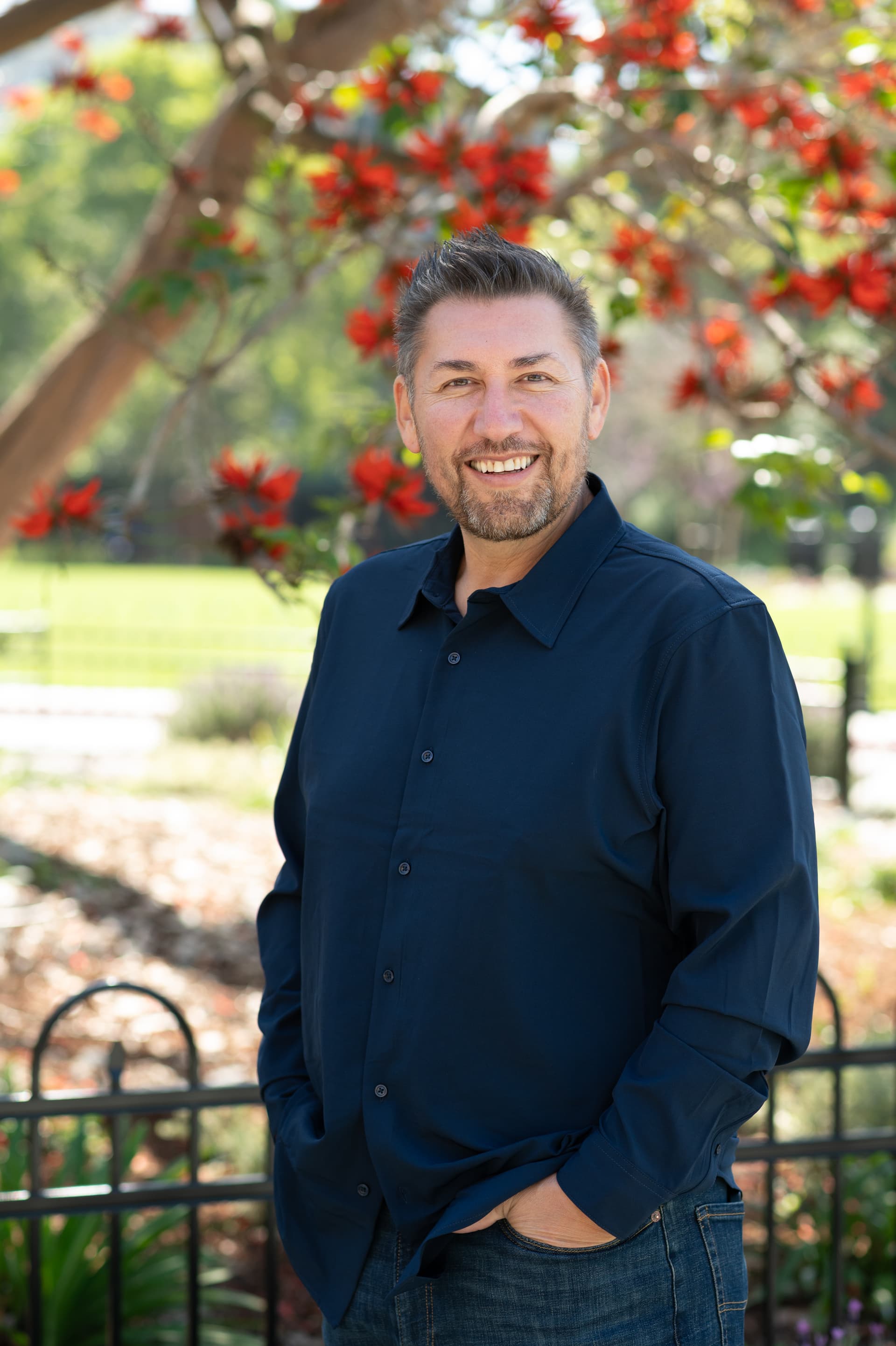 Dr. Paulo F. Cortes, DMD, standing outdoors
